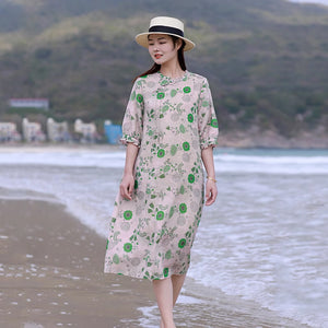 Đầm liền linen ngắn tay cổ tròn kiểu vạt lệch in hoa lá xanh - NU8584