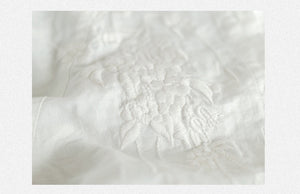 Áo sơ mi linen tay lửng cổ đức thêu retro in lông vũ - NU8568