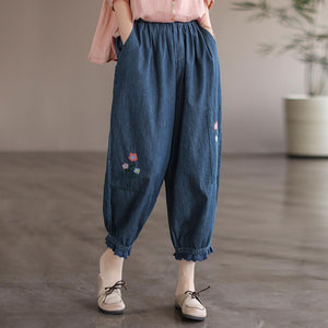 Quần baggy denim thêu hoa gấu thun đính ren - NU7626
