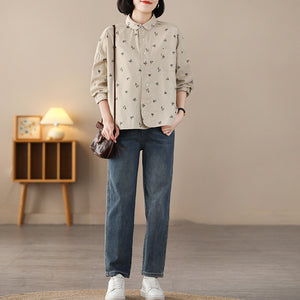 Áo sơ mi dài tay cổ pipi một túi in hoa lá vạt mullet - NU8237