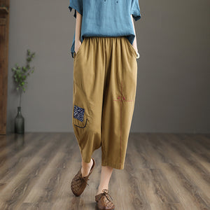Quần baggy linen lưng thun thêu hoa văn hai túi chéo - NU6877