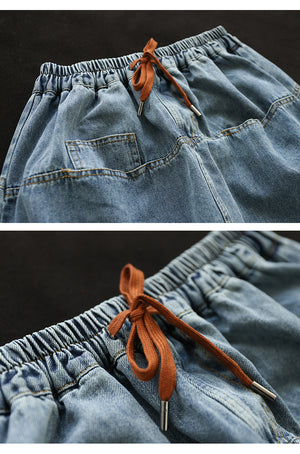 Chân váy denim lưng thun thêu những bông hoa một túi sau - NU8292