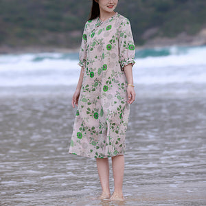 Đầm liền linen ngắn tay cổ tròn kiểu vạt lệch in hoa lá xanh - NU8584