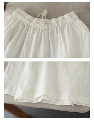 Quần baggy linen lưng thun dây rút ống rộng thêu hoa lá - NU8294