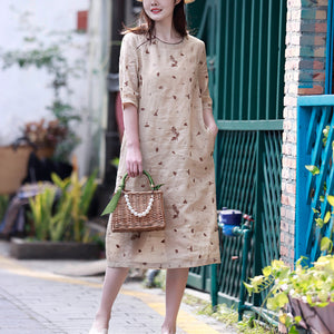 Đầm liền linen ngắn tay cổ tròn thêu hoa lá đơn sắc - NU8440
