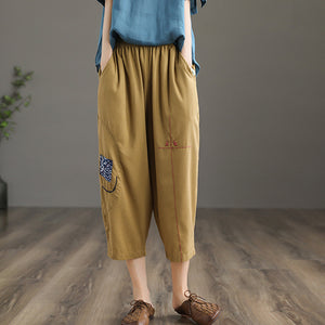 Quần baggy linen lưng thun thêu hoa văn hai túi chéo - NU6877