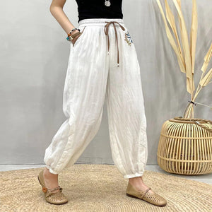 Quần baggy linen lưng thun thêu hoa hoa lá ống túm - NU8455
