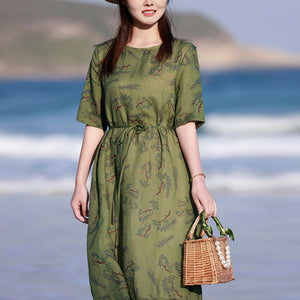 Đầm liền linen in hoa lá ngắn tay cổ tròn eo thắt dây - NU8579