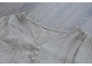 Áo sơ mi linen ngắn tay cổ V hai túi vuông vạt ngang - NU7422
