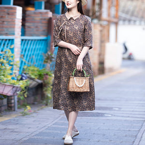 Đầm liền linen ngắn tay cổ pipi khuy chéo in hoa liti - NU8277