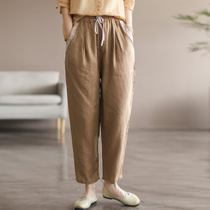 Quần baggy linen lưng thun dây rút hai túi viền thêu hoa văn - NU7167
