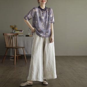 Áo sơ mi linen ngắn tay cổ pipi khuy cài sau in hoa lá - NU7407
