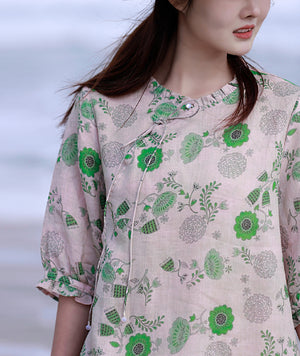 Đầm liền linen ngắn tay cổ tròn kiểu vạt lệch in hoa lá xanh - NU8584