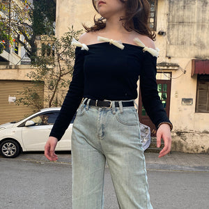 Áo T-shirt dài tay trễ vai kiểu đính nơ - NU8334