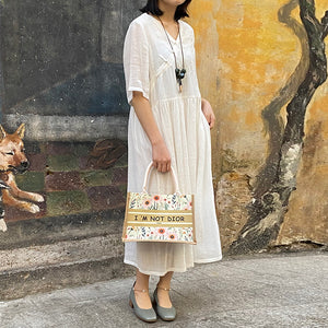Đầm liền linen ngắn tay cổ V khuy tàu thêu hoa văn đồng màu - OD0616
