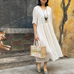Đầm liền linen ngắn tay cổ V khuy tàu thêu hoa văn đồng màu - OD0616